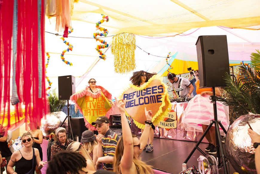 people on a stage dancing